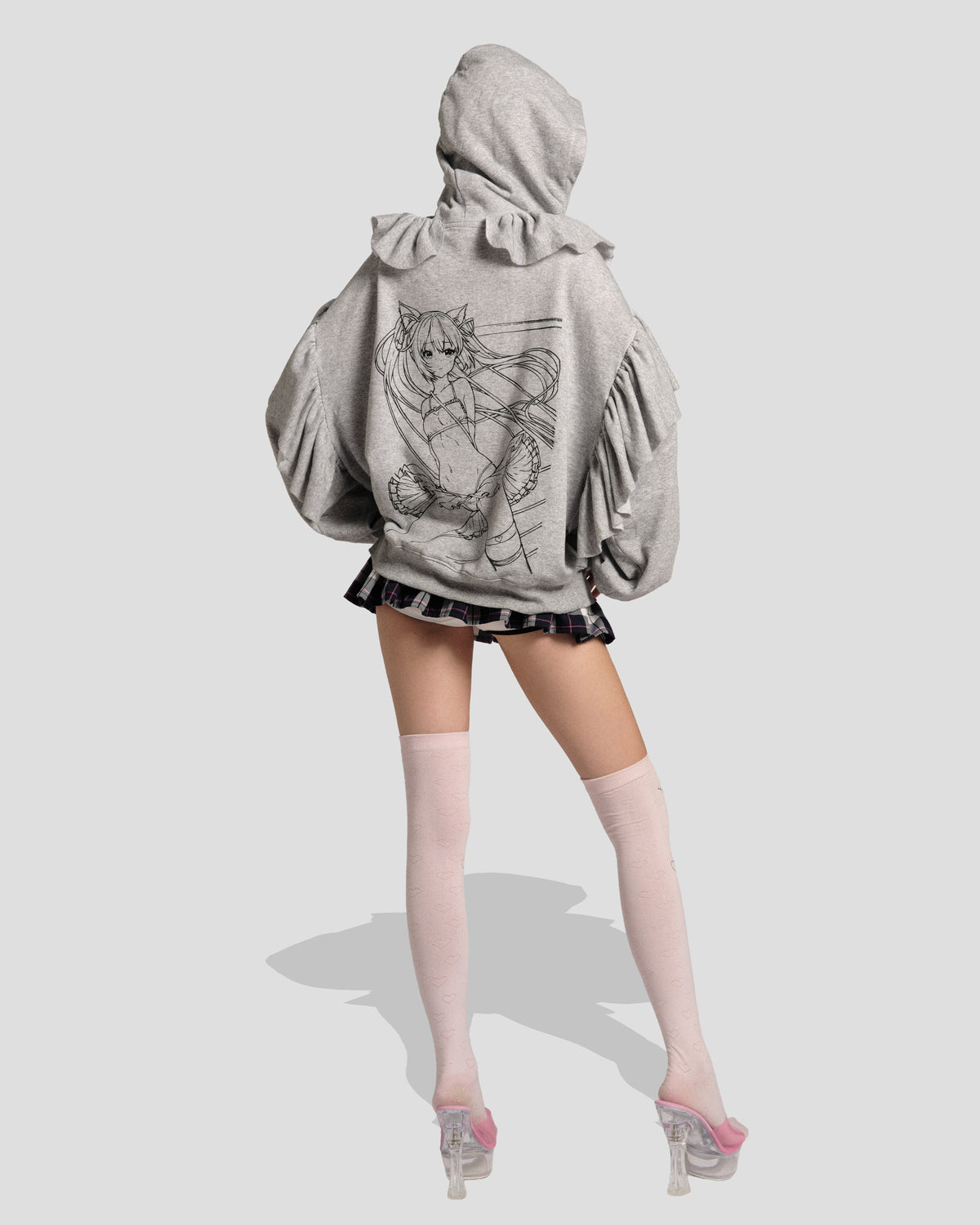 The Kitty Senshi Ruffle Zip Hoodie, full-length back view with the hood up and anime back print