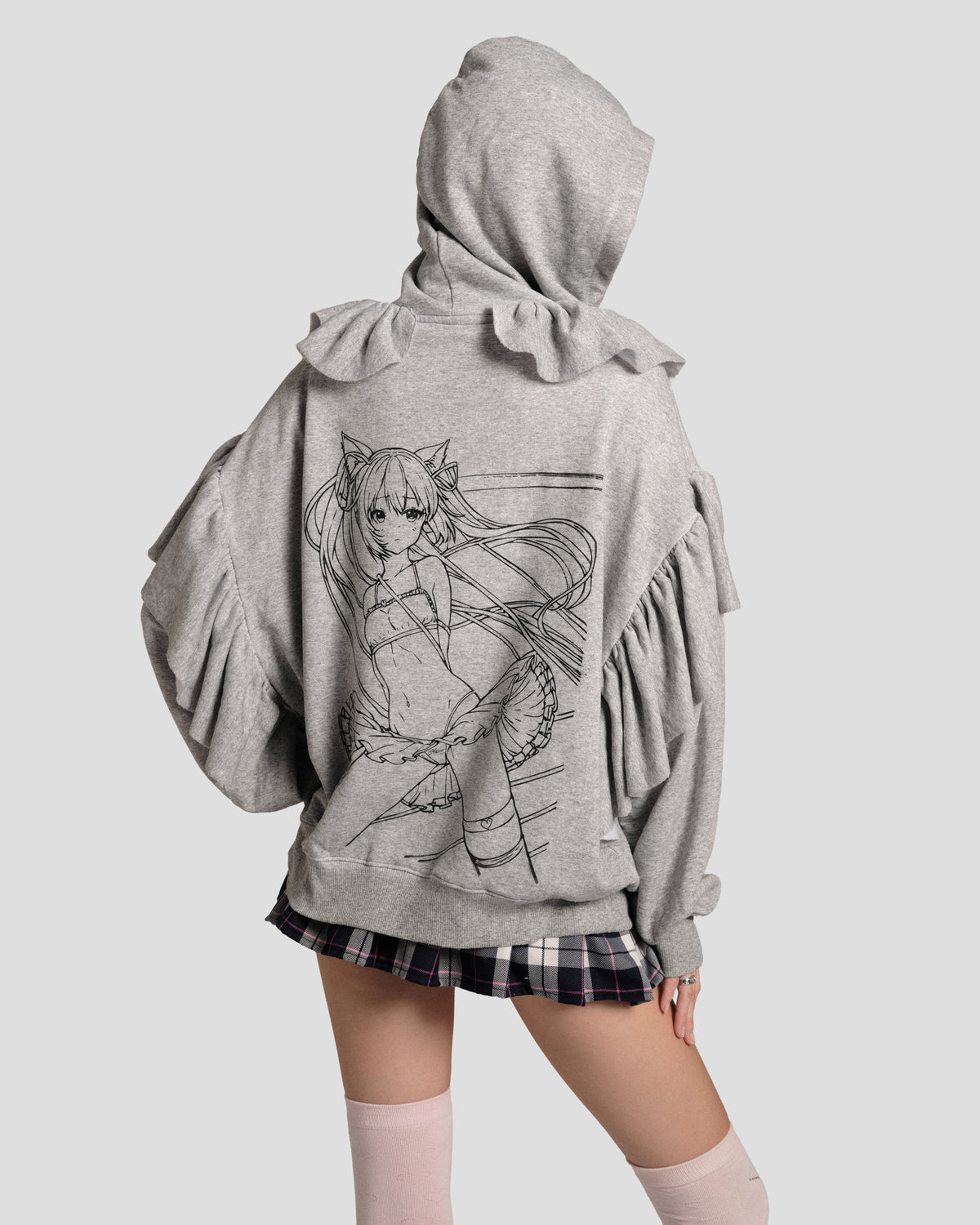 The Kitty Senshi Ruffle Zip Hoodie, back view of the anime print with the hood up